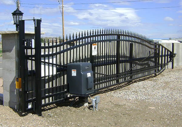 Ornamental Iron Cantilver Gate for Ashcroft Kennels in Ft Collins